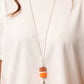 Reel It In - Orange Necklace